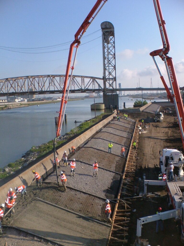 Workers in safety equipment working on East Side Locks.
